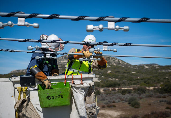 SDG&E Employees working on covered conductors 