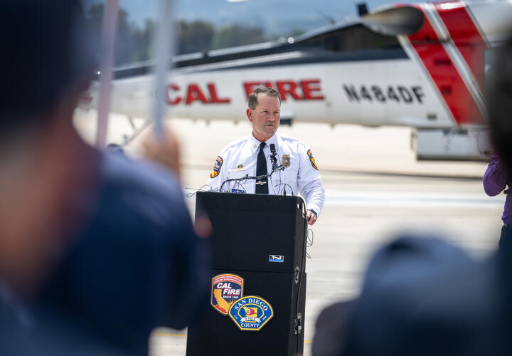 Tony Mecham addresses attendees during a press conference