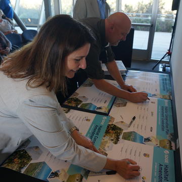 Estela de Llanos signs commemorative Habitat Conservation Plan amendment