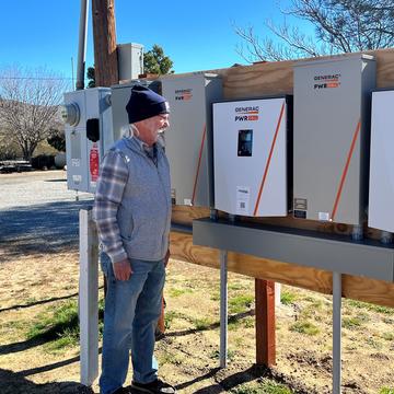 Shelter Valley Community Center Board President Steve Bassett inspects installation at Shelter Valley Community Center site.