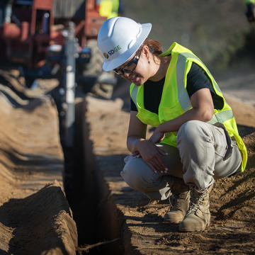 SDG&E employee inspects trench at an undergrounding worksite