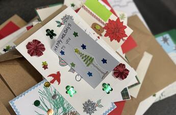 Multiple holiday cards on the table
