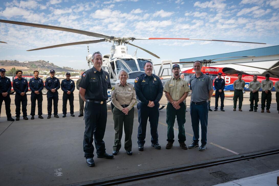 A group photo of SDG&E President Scott Crider, joined by members of CAL FIRE and other regional public safety agencies.