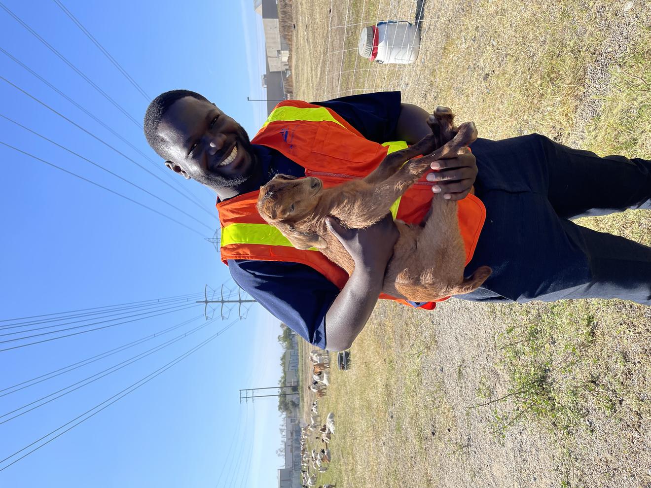 Kazeem and baby goat