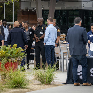 Image of individuals registering for an SDG&E community partners event. 