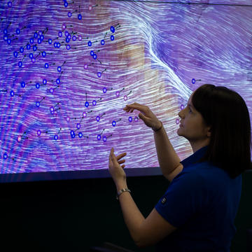 SDG&E Meterologist tracking severe weather on a large screen