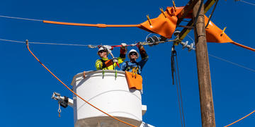 Linemen in a basket