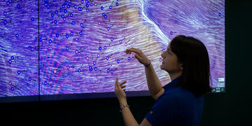 SDG&E Meterologist tracking severe weather on a large screen